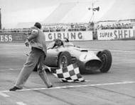 Juan FANGIO crossing the finish line first in his FERRARI at the Silverstone Grand Prix in England. (Photo by Keystone-France/Gamma-Keystone via Getty Images)
